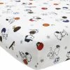 Lambs & Ivy Bedtime Originals Snoopy Sports White/Blue/Red Baby Fitted Crib Sheet